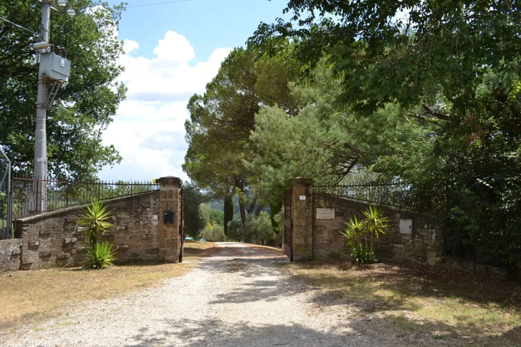 Stone entrance gate to Le Forre del Treja estate