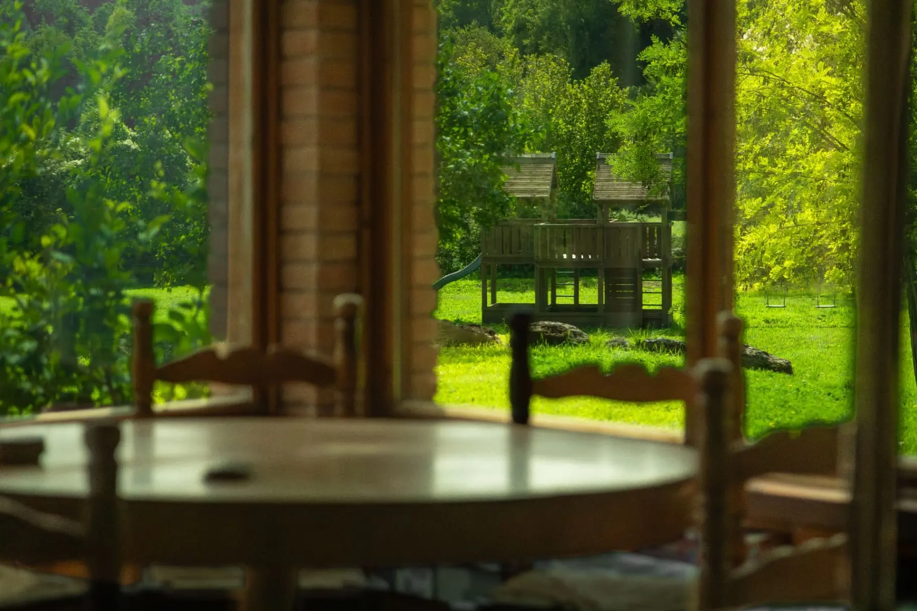 View from dining room to outdoor playground