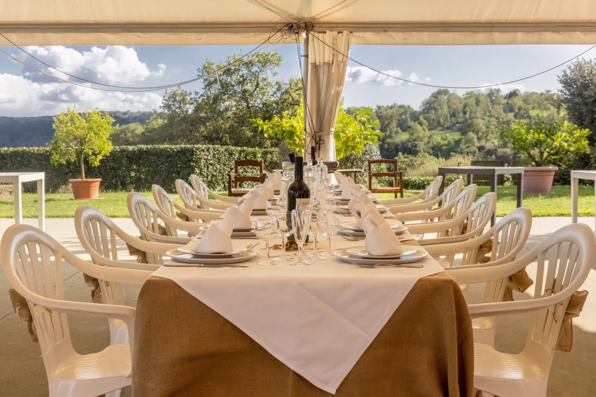 Long wedding banquet table with elegant place settings