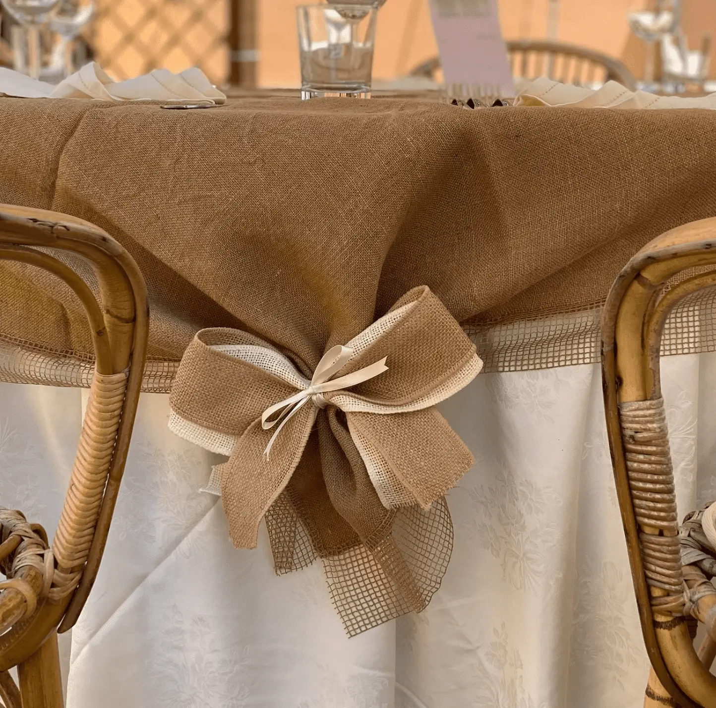 Elegant table setting with burlap details and rustic decor